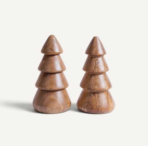Two small wooden tree-shaped decorative objects with a smooth, rounded tiered design, shown side by side on a plain light beige background.