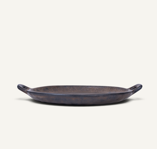 A Japanese style ceramic platter in bronze finish with side handles, photographed on a clean off-white background.