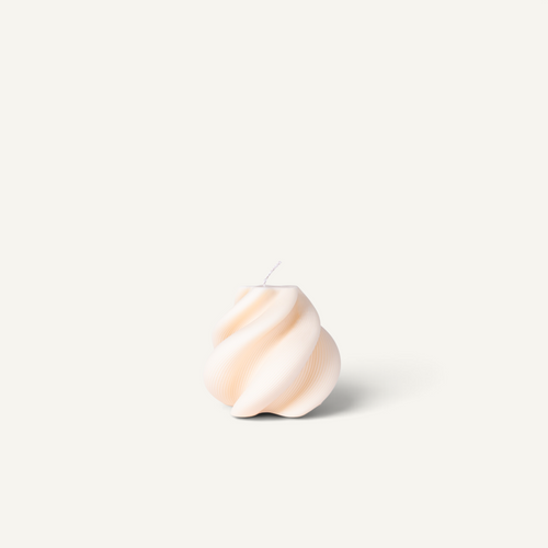 A sculptural spiral-shaped candle in a cream color, featuring a single wick, set against a solid off-white background.