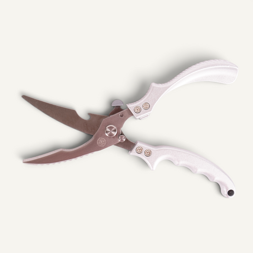 A pair of stainless steel poultry shears shown on a light off-white background.