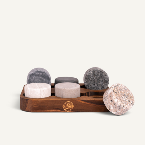 6 granite round whiskey chilling stones with a sleek wooden tray